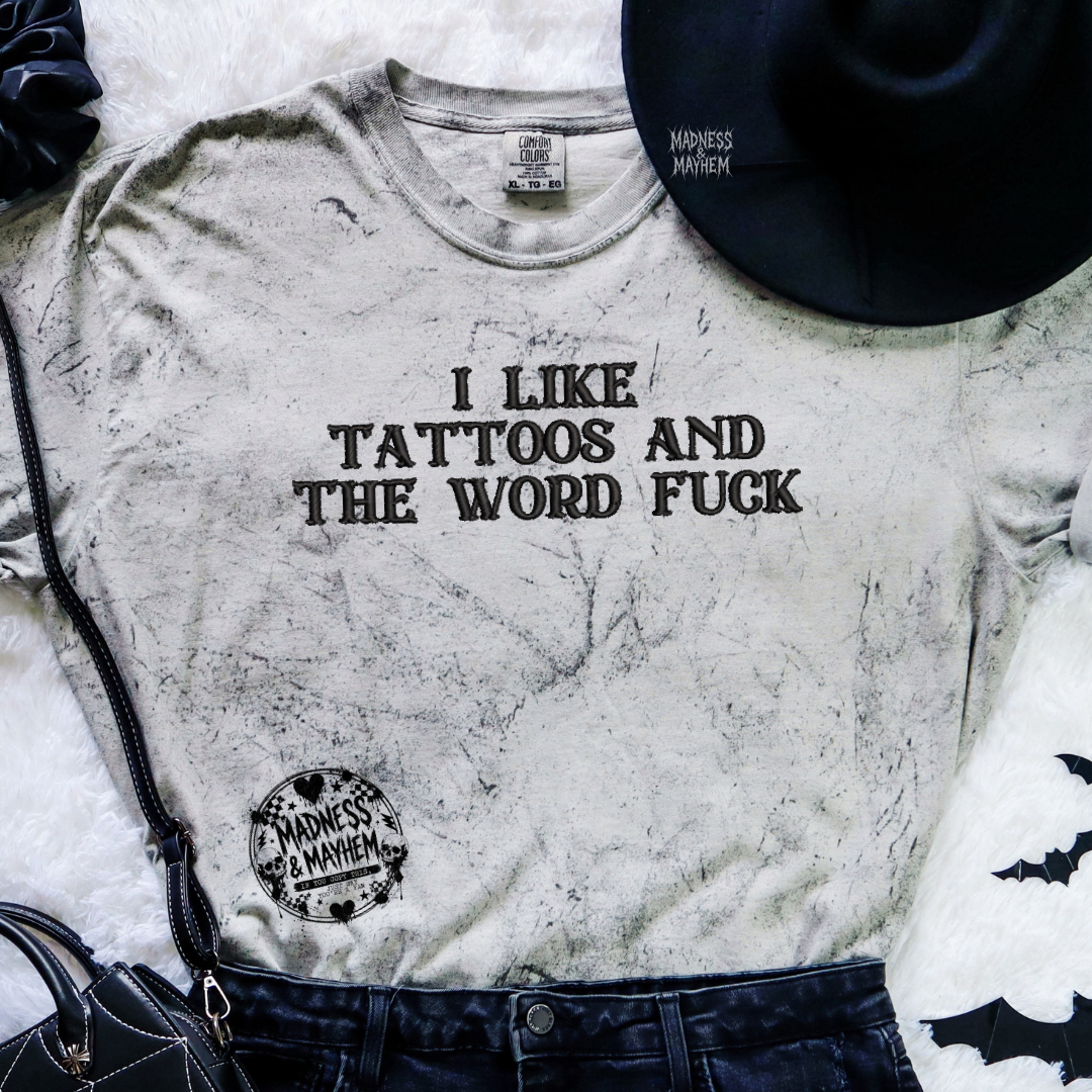 Tattoos & the word fuck embroidered color blast tshirt