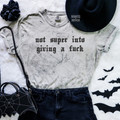 Not into giving a fuck embroidered color blast tshirt